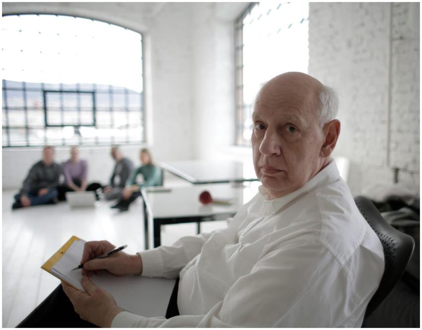 Senior male executive concentrating during a team