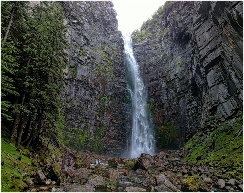 Breathtaking waterfall cascading through rocky cli