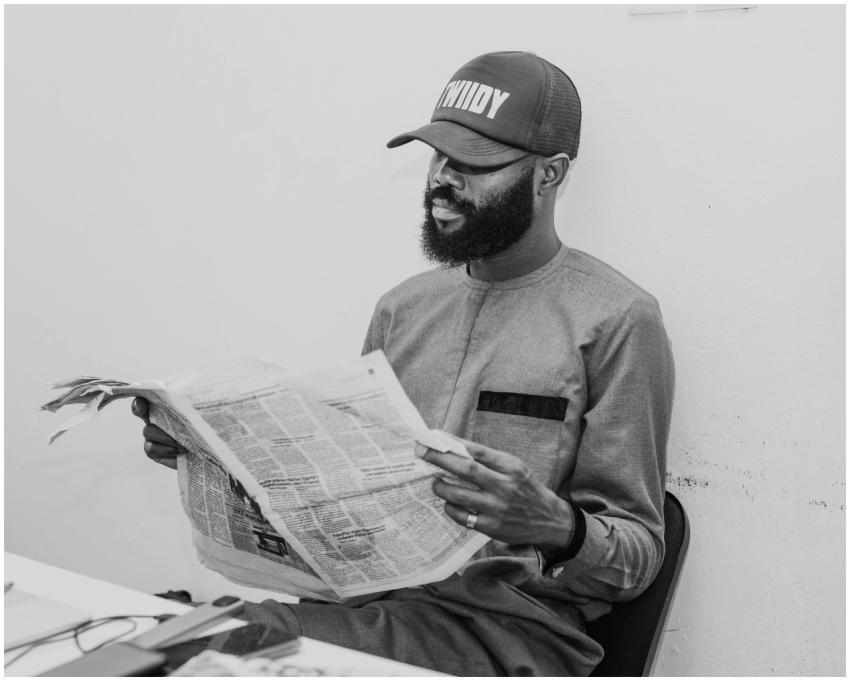 Man Reading Newspaper Minimalist