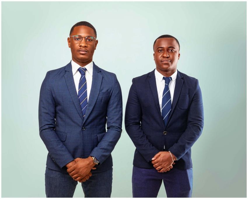 Two professional businessmen posing in formal suit