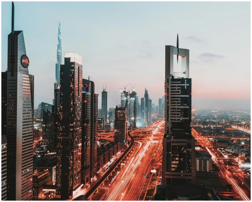 Dynamic view of Dubai's illuminated skyline featur