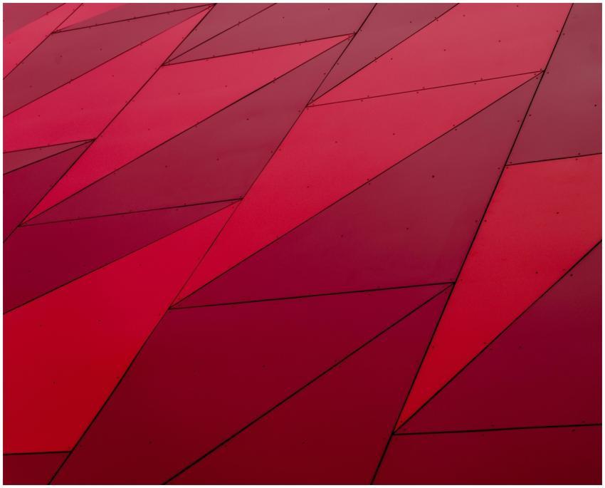 An abstract geometric pattern with red triangles,