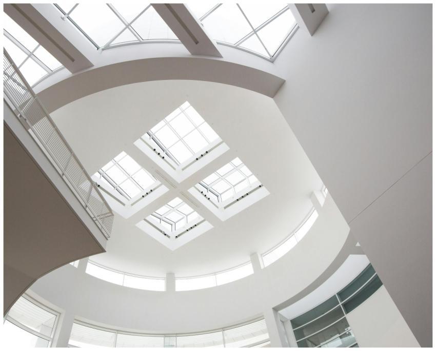 Elegant modern ceiling with geometric skylights in