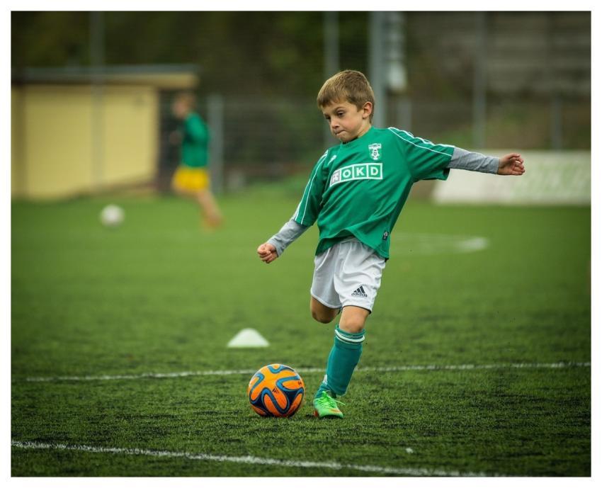 Child Soccer Playing Kick