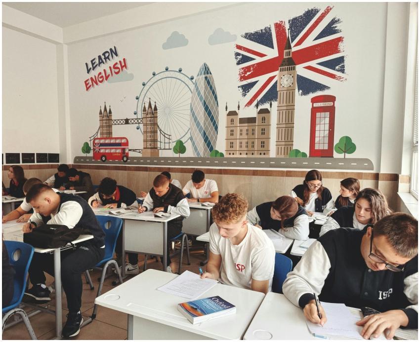 Students studying English in a classroom with Brit