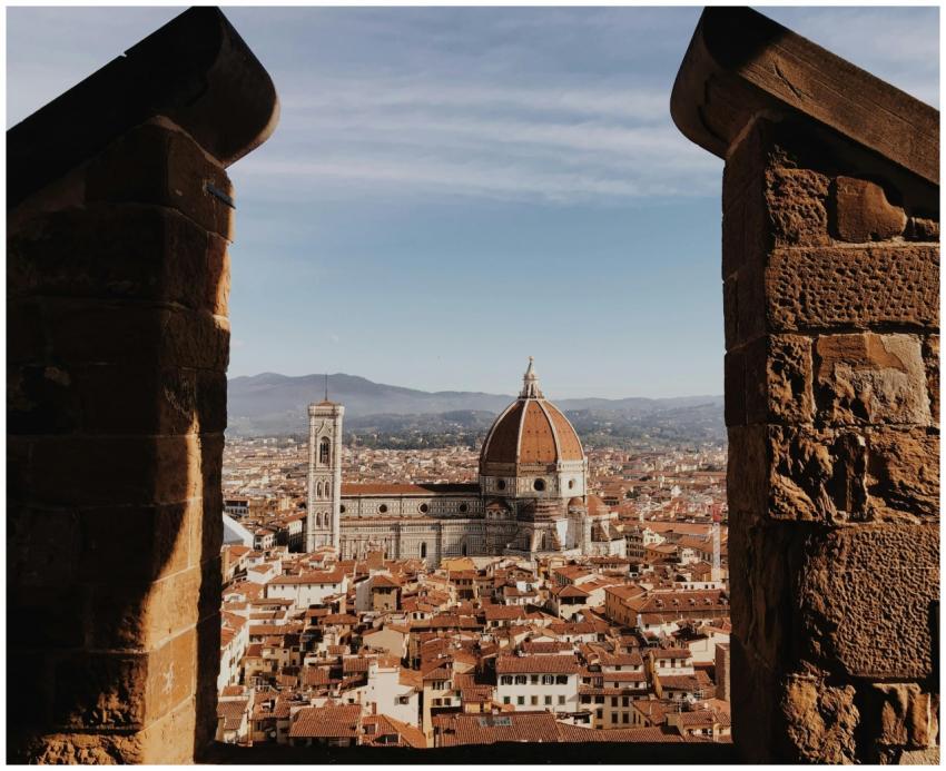 A breathtaking view of Florence Cathedral framed b