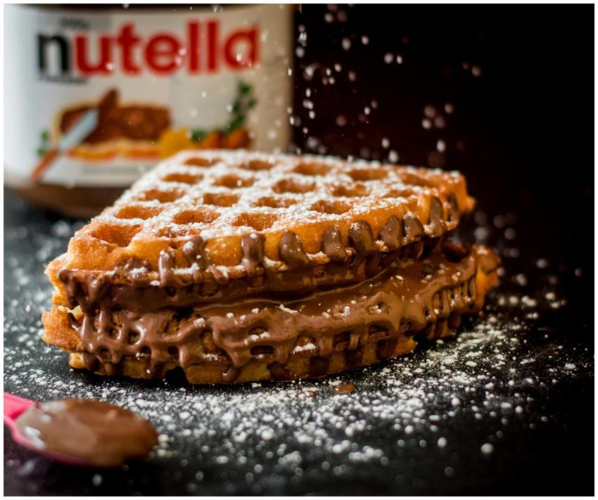 Delicious waffles with creamy chocolate hazelnut s