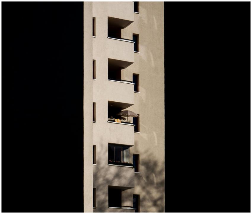 Close-up of a modern apartment building's facade w