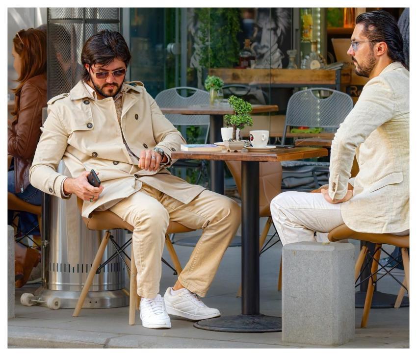 Men Tourists Sunglasses Sitting