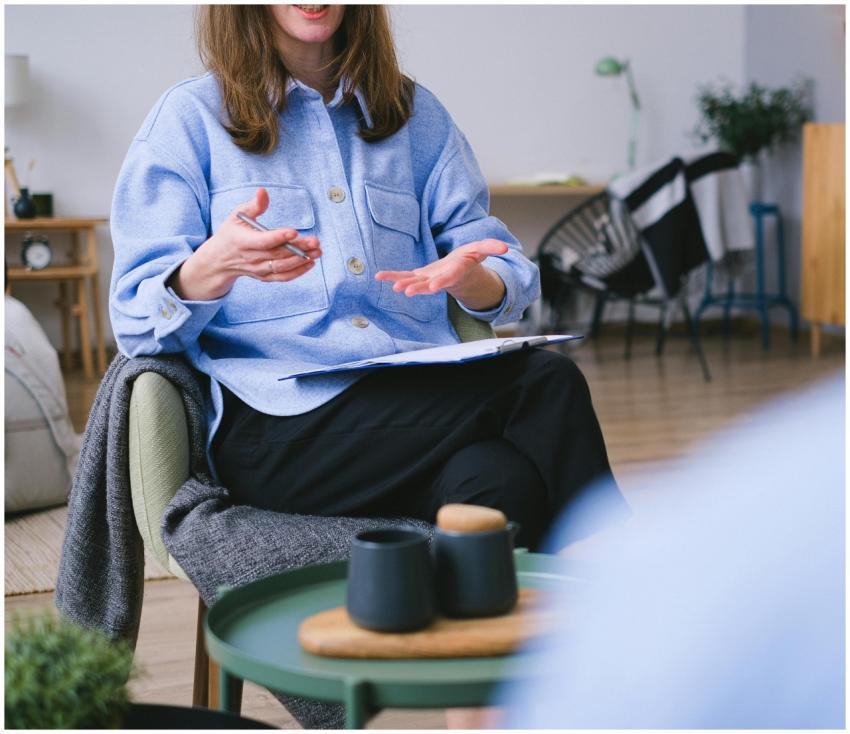 A therapist consults with a client in a contempora