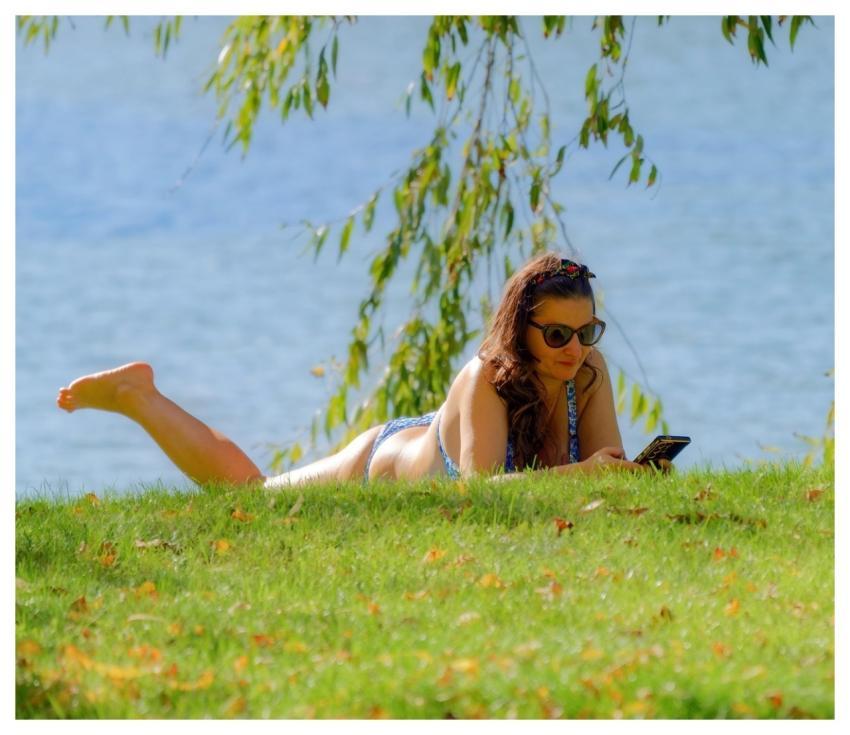 Woman Nature Tanning Grass