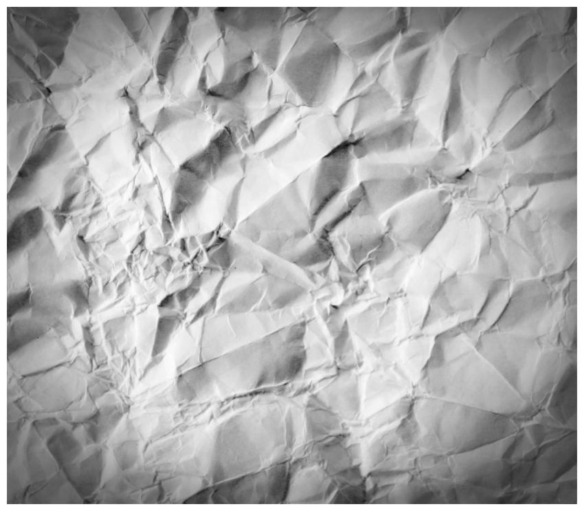 High-resolution crumpled white paper texture ideal