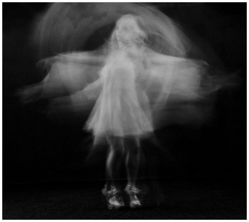 Black and white image capturing the graceful motio