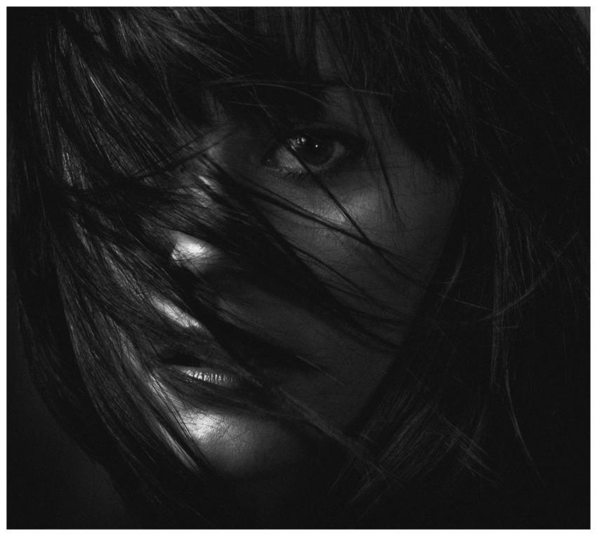 Artistic black and white portrait capturing the dr