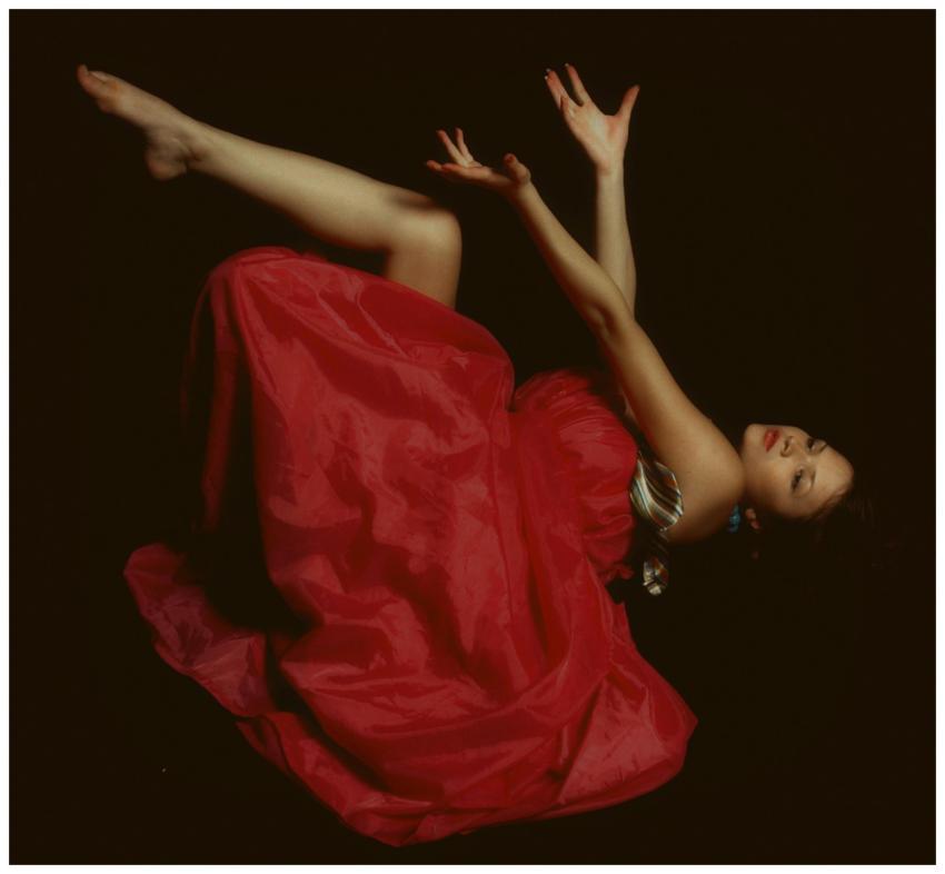 Captivating flamenco dancer in a vibrant red dress