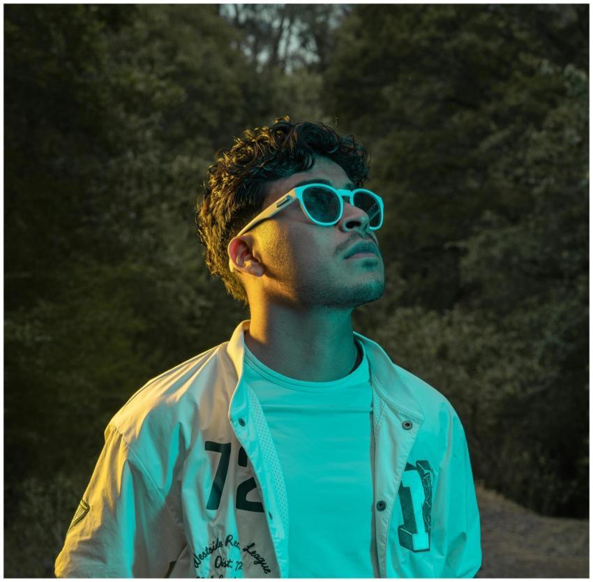 Portrait of a stylish young man wearing sunglasses