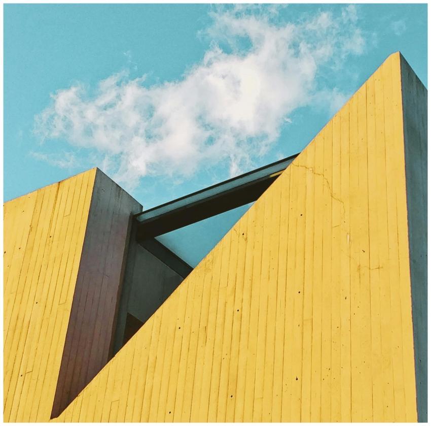 Contemporary architecture featuring bold yellow wa