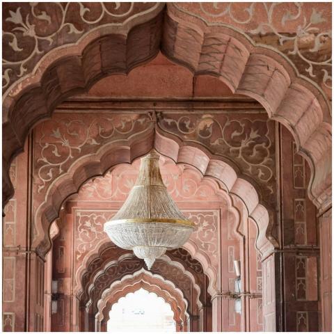 Detailed view of arches and chandelier in Mughal a