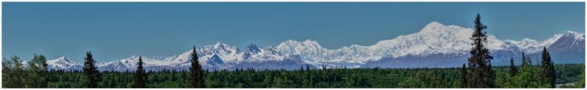 Breathtaking panorama of snow-capped mountains and