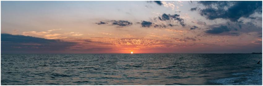 A breathtaking sunset over the ocean with vibrant