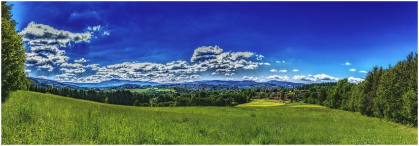Breathtaking view of a lush green countryside unde