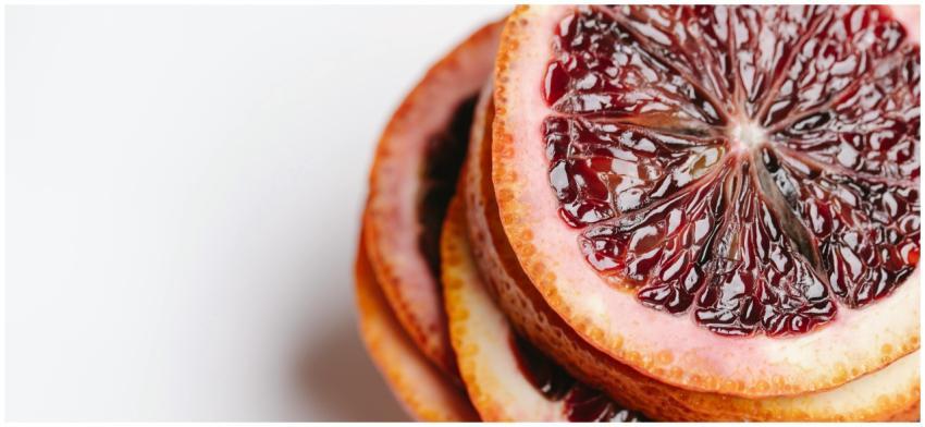 Close-up of fresh blood orange slices showcasing v