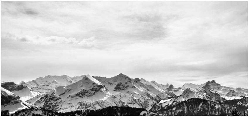Stunning monochrome landscape of snow-covered alpi
