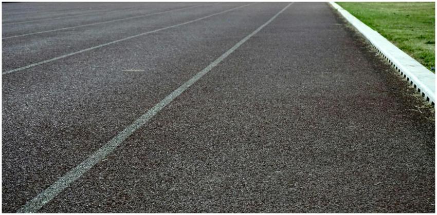 A detailed view of an empty outdoor running track