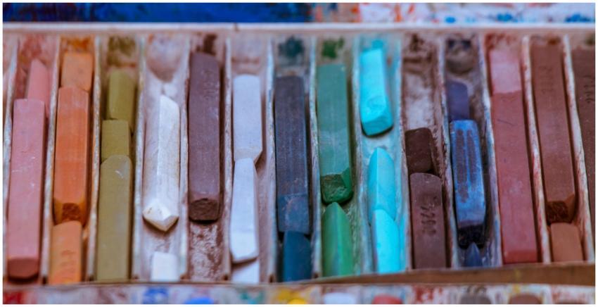 Close-up of colorful oil pastels arranged neatly i