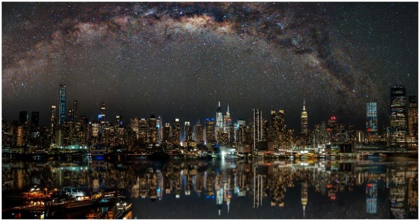 Nighttime view of New York City with stars reflect