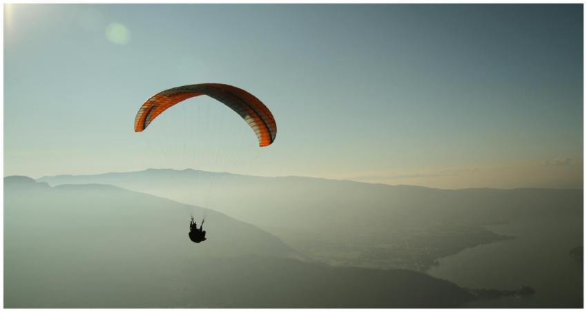 Experience the thrill of paragliding over the stun