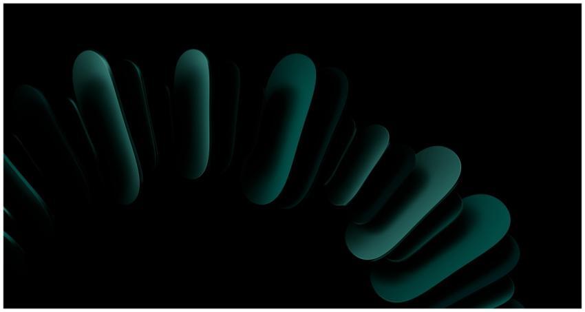 A striking abstract image with dark teal shapes fo