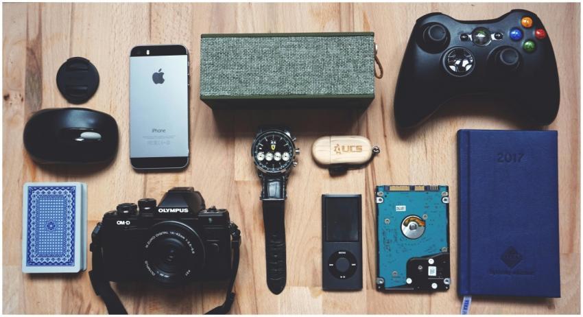Flat lay of various modern gadgets, accessories, a
