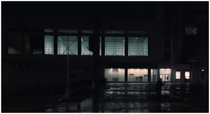 Night view of a modern building with illuminated w