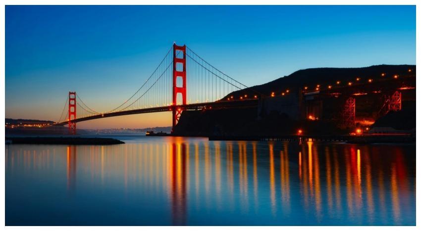 Golden Gate Bridge reflecting in the water during