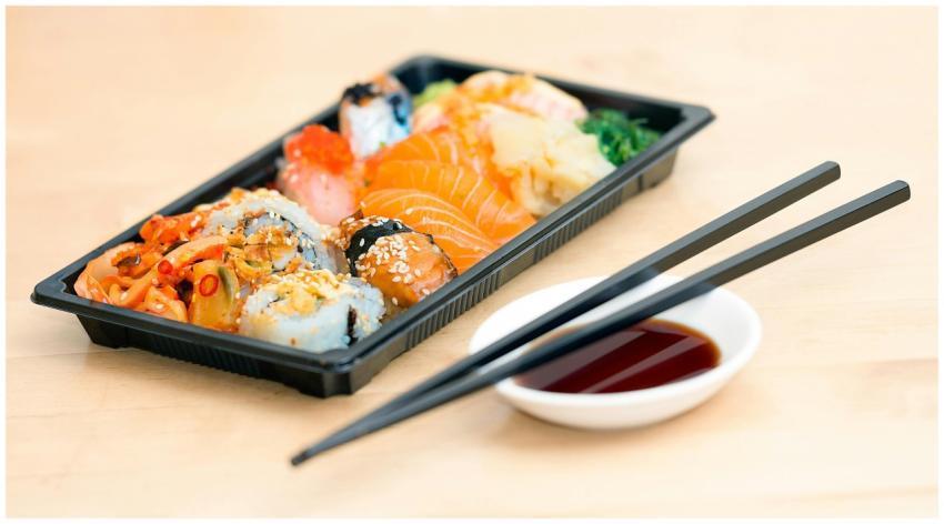 A mouthwatering assortment of sushi rolls and sash