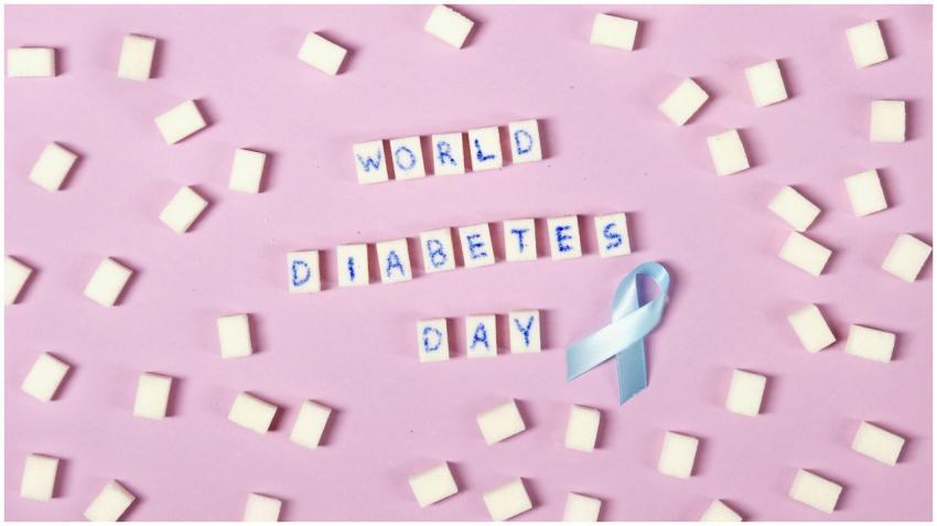 Creative flat lay of World Diabetes Day with sugar