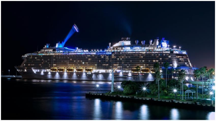A stunning view of a cruise ship illuminated and d