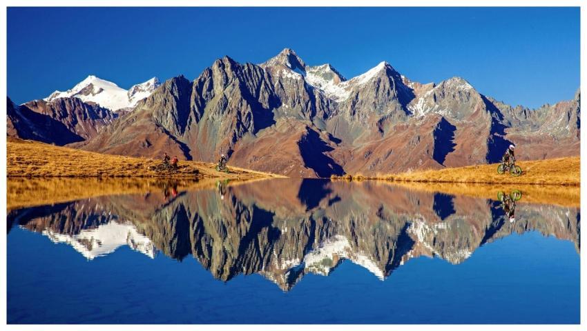 Majestic mountains reflected in Zupalsee with cycl