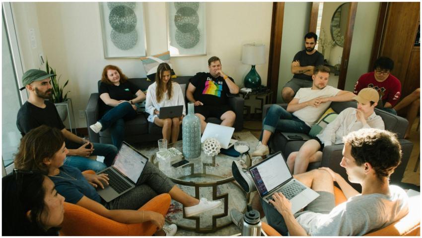 A diverse group of adults collaborating in a relax