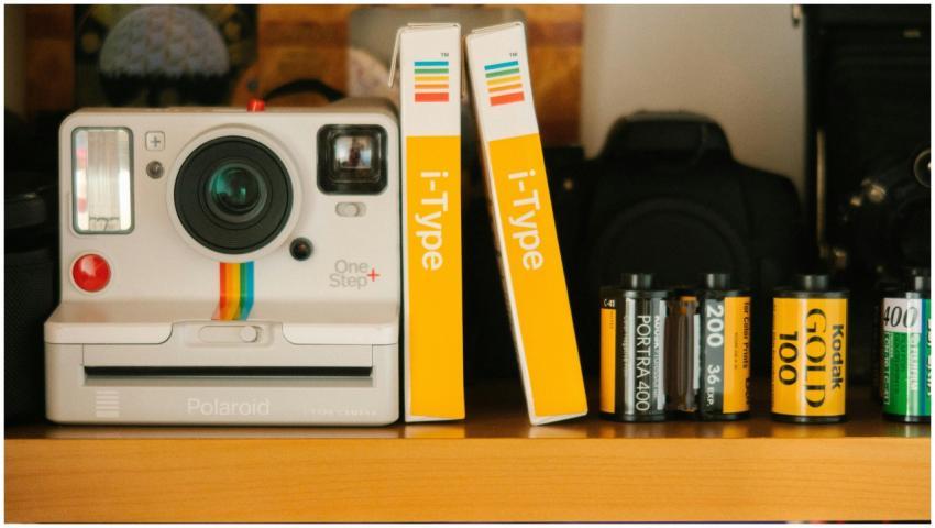 A classic Polaroid OneStep Plus camera with film r