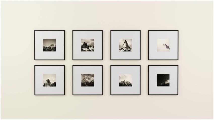 A minimalist display of framed mountain photograph