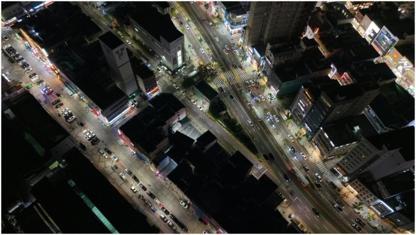 A dynamic aerial view of Busan's city streets at n