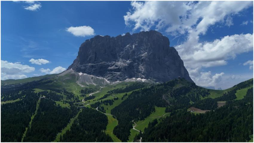A stunning view of the Dolomites with lush greener