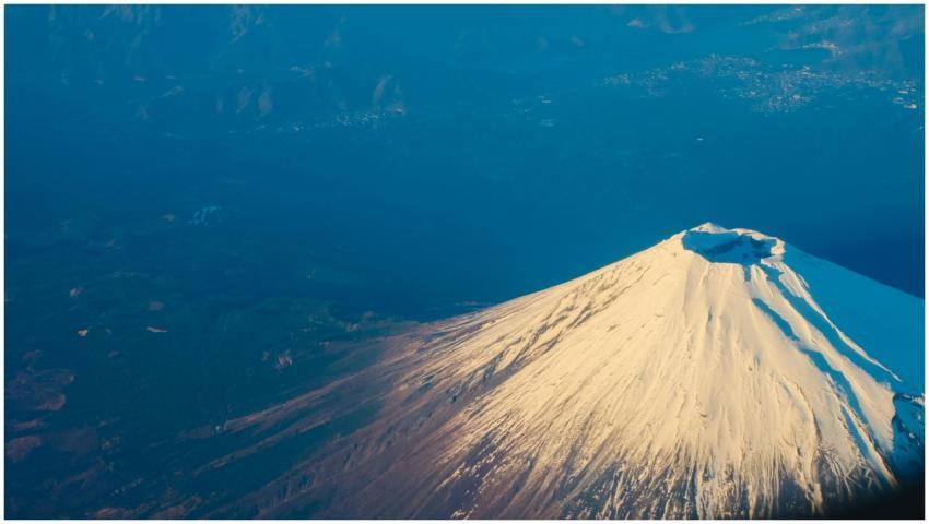 Stunning aerial view of Mount Fuji's snow-capped p