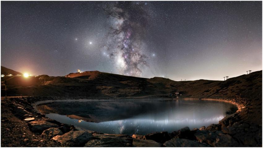 A breathtaking view of the Milky Way over a serene