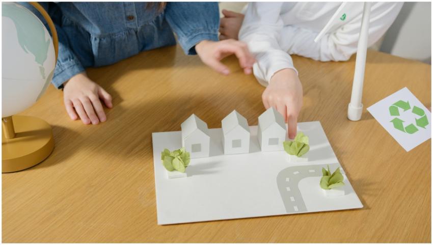 Children interacting with a paper model of eco-fri