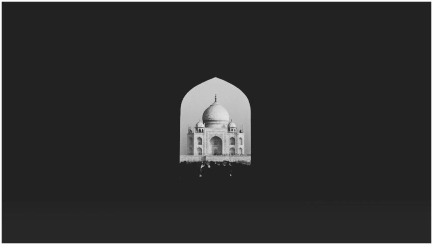 Black and white photo of the Taj Mahal framed by a