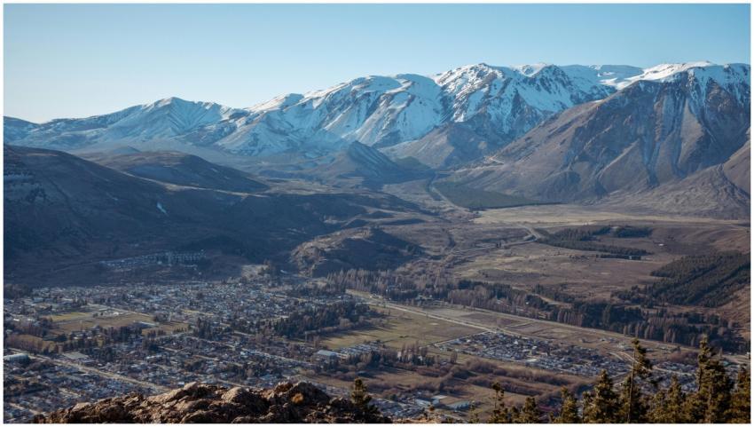 Breathtaking aerial view of a town against snow-ca