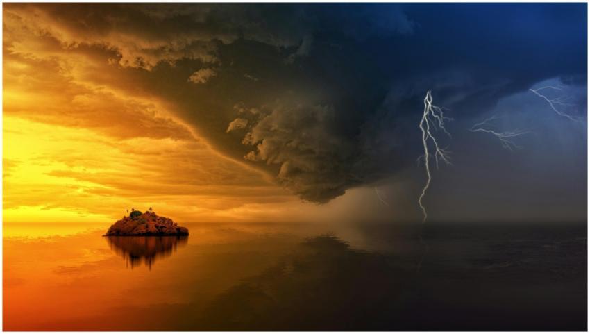 A stunning display of a stormy sunset with lightni